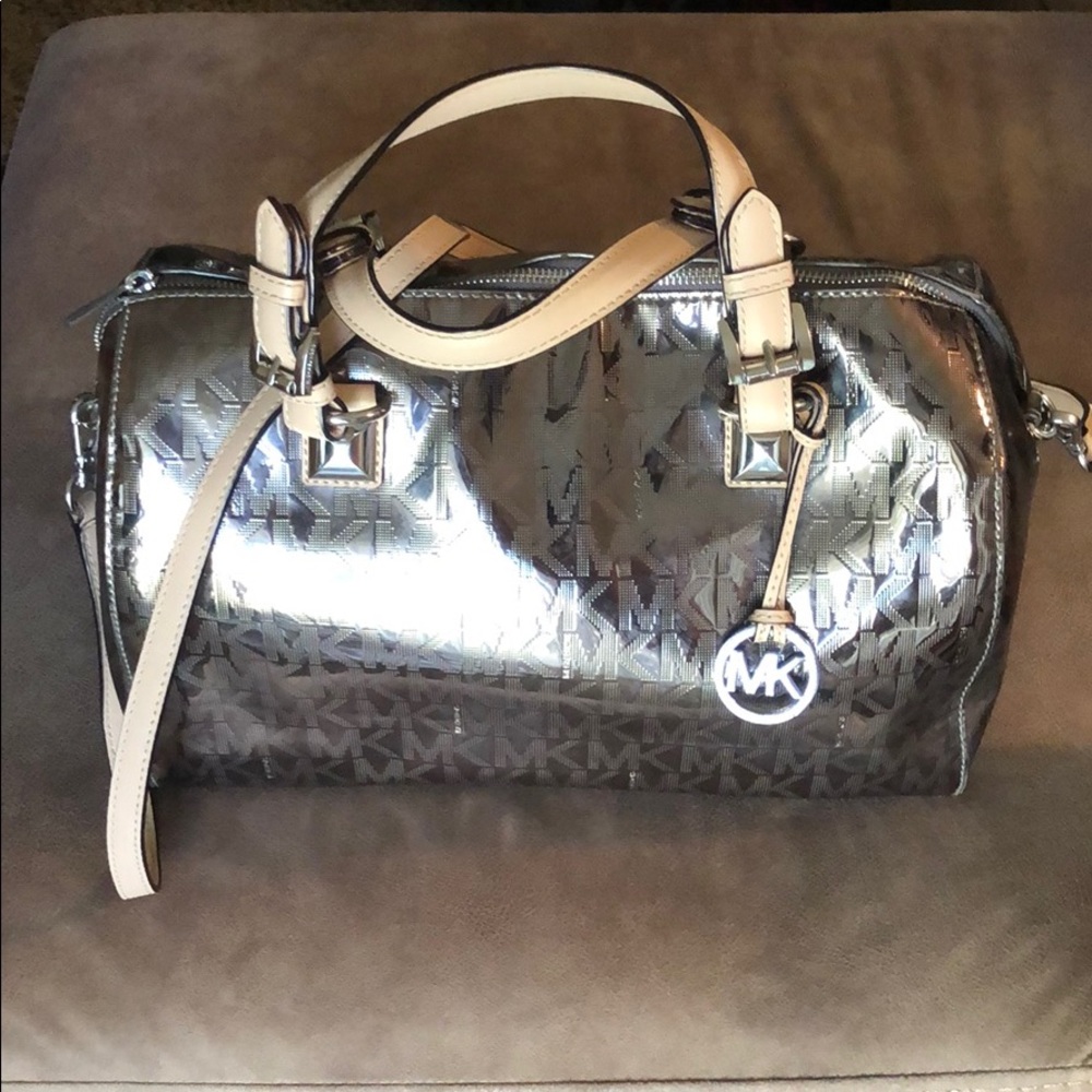 reposhing. Michael Kors Metallic Silver Monogram Satchel. see pics